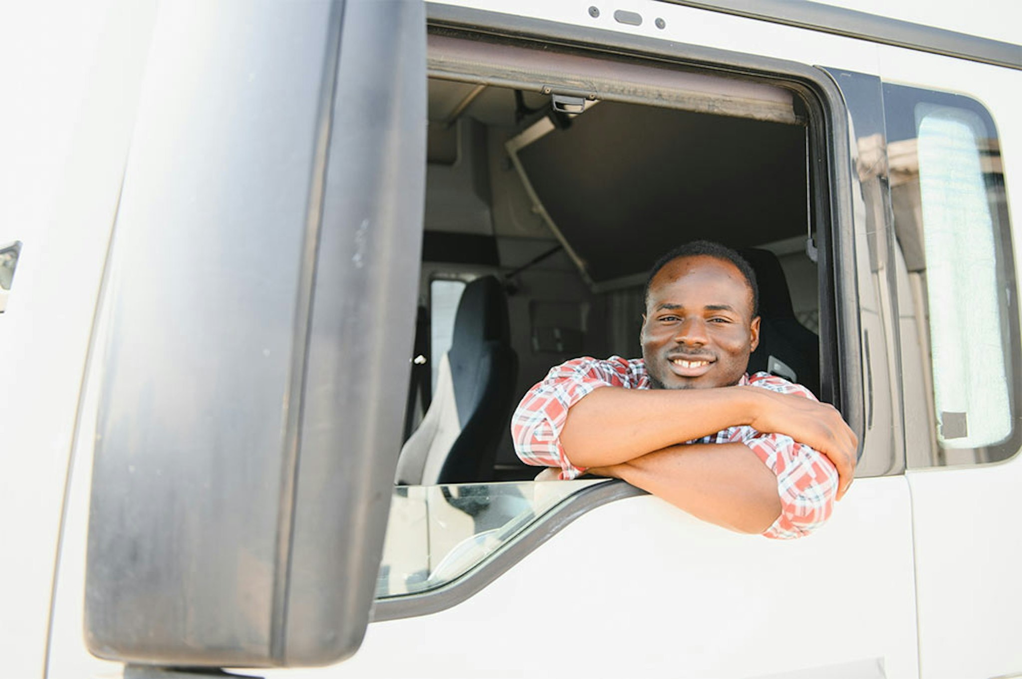 Man leaning out of truck window